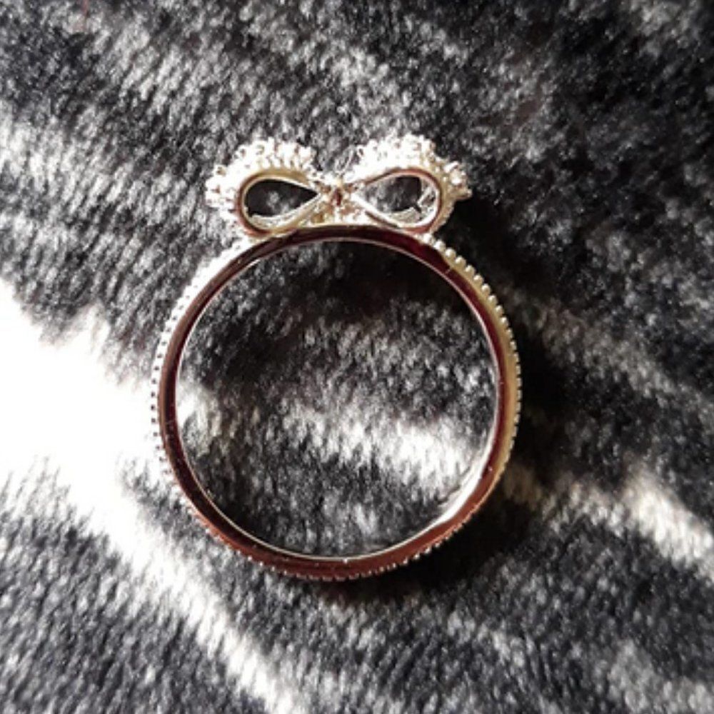 .925 Sterling Silver with White Diamond Cubic Zirconia Infinity Forever Bow Ring - Picture 5 of 10